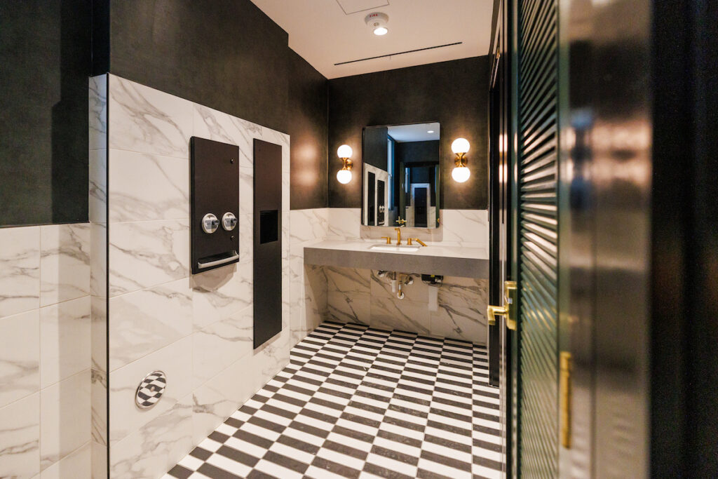 renovated bathroom with checkered flooring