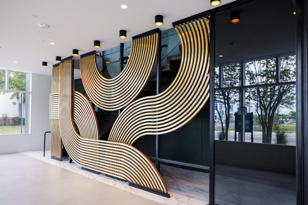 sculptural wall in entry way of venue